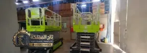 تاج المملكة | تأجير رافعات مقصية الدمام | معتمدة للشركات والمستودعات